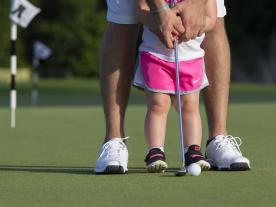 Father and Daughter Putting